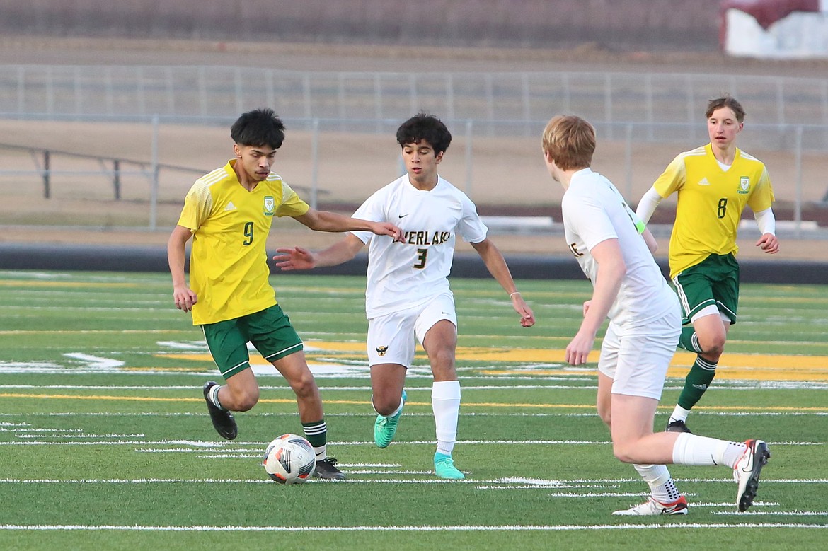 Ken Morales, Quincy, maneuvers among defenders in a 2024 non-league game. Quincy’s move to Class 2A will be an opportunity for the Jacks, said Coach Hector Vaca.