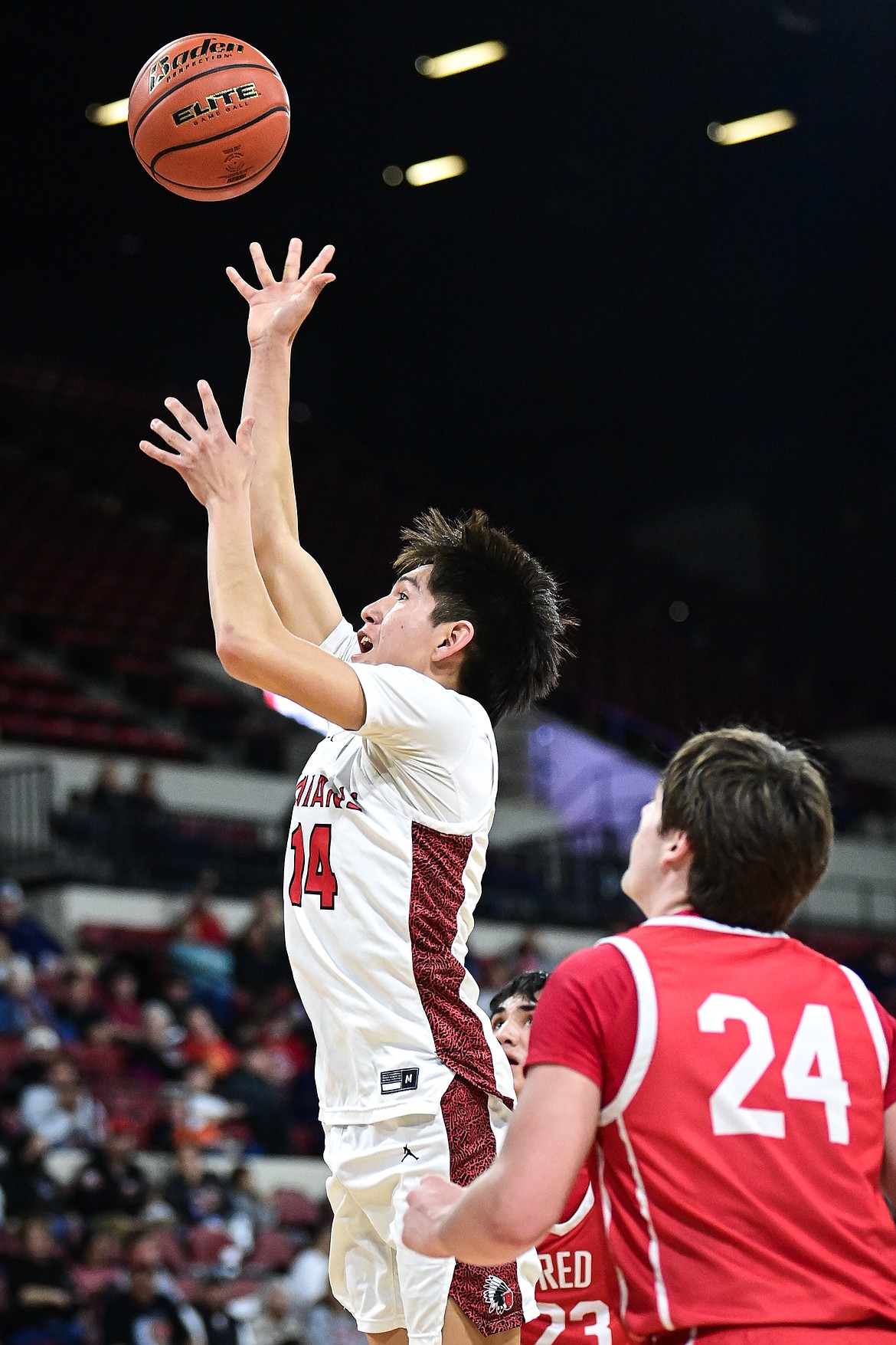 Browning's Joshua Skunkcap (14) rises to shoot in the second half against Glendive at the Class A State Basketball Tournament at the MetraPark First Interstate Arena in Billings on Thursday, March 13. (Casey Kreider/Daily Inter Lake)