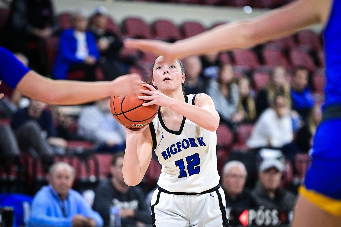 Bigfork's Keni Wade (12) shoots in the first half against Lewistown at the Class A State Basketball Tournament at the MetraPark First Interstate Arena in Billings on Friday, March 14. (Casey Kreider/Daily Inter Lake)