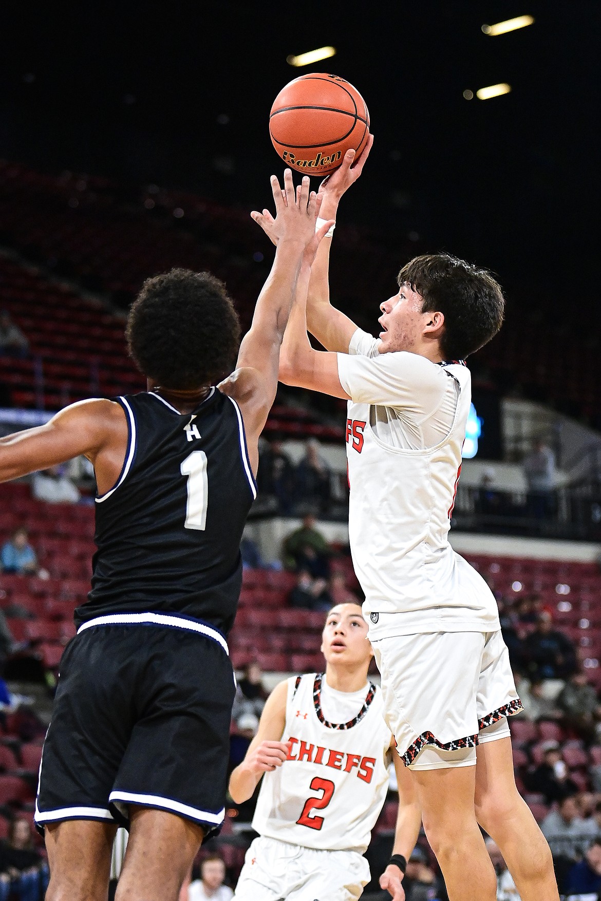 Ronan's Wade Qualtier (11) drives to the basket in the fourth quarter against East Helena at the Class A State Basketball Tournament at the MetraPark First Interstate Arena in Billings on Friday, March 14. (Casey Kreider/Daily Inter Lake)
