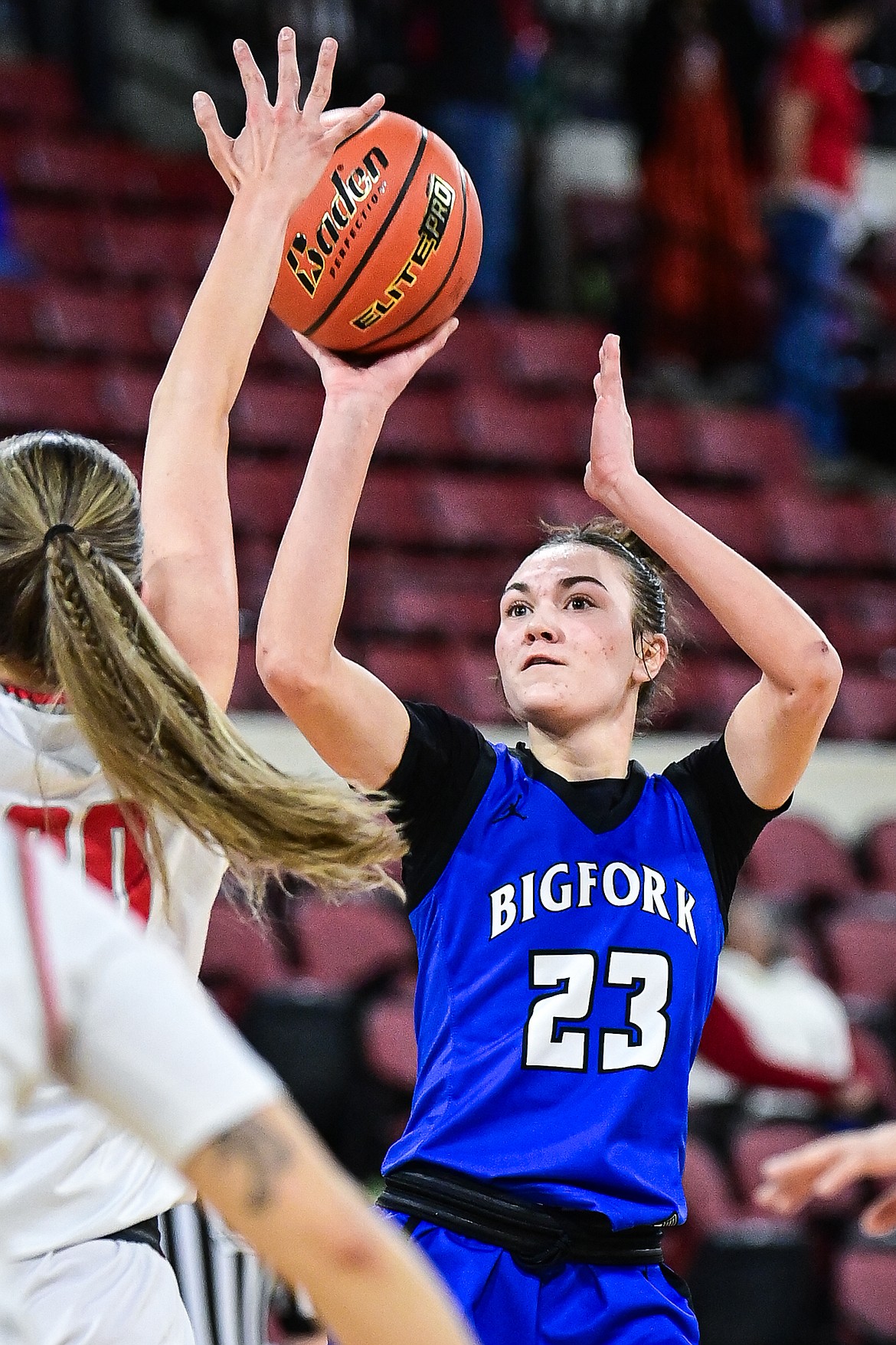Bigfork's Paeten Gunlock (23) shoots in the fourth quarter against Lockwood at the Class A State Basketball Tournament at the MetraPark First Interstate Arena in Billings on Saturday, March 15. (Casey Kreider/Daily Inter Lake)