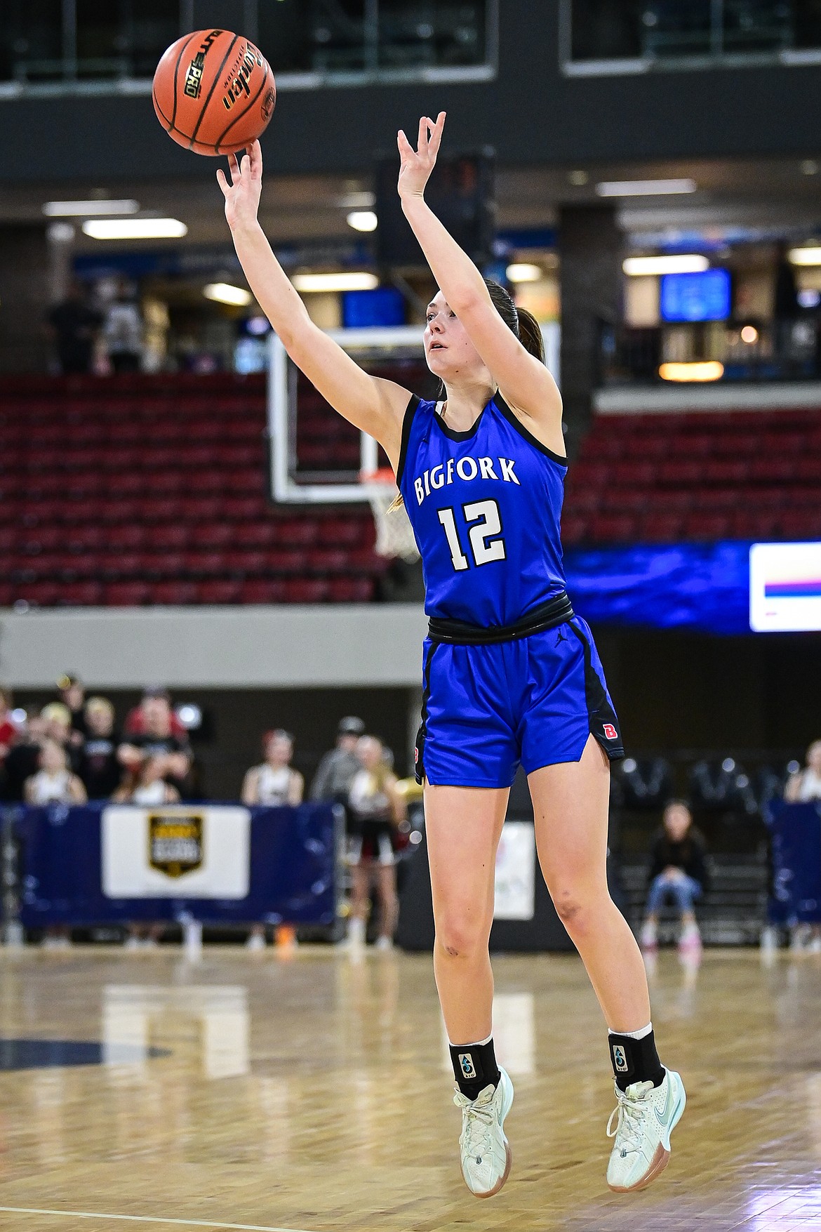 Bigfork's Keni Wade (12) shoots in the second half against Lockwood at the Class A State Basketball Tournament at the MetraPark First Interstate Arena in Billings on Saturday, March 15. (Casey Kreider/Daily Inter Lake)