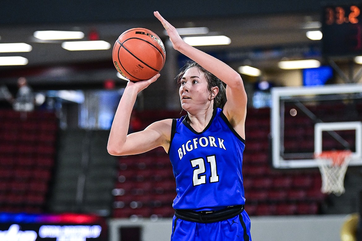 Bigfork's Braeden Gunlock (21) shoots in the second half against Lockwood at the Class A State Basketball Tournament at the MetraPark First Interstate Arena in Billings on Saturday, March 15. (Casey Kreider/Daily Inter Lake)