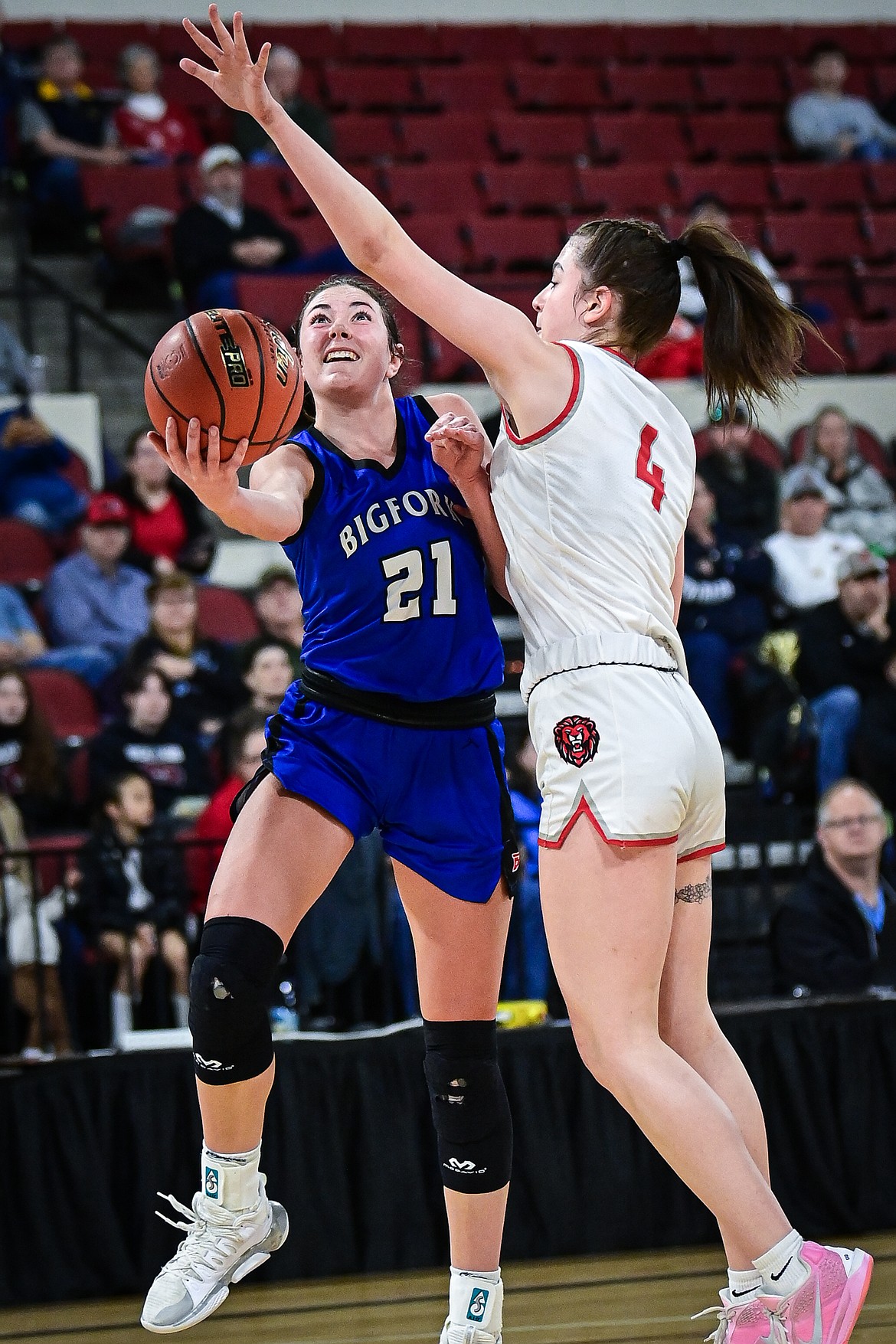 Bigfork's Braeden Gunlock (21) makes a move to the basket in the second quarter against Lockwood at the Class A State Basketball Tournament at the MetraPark First Interstate Arena in Billings on Saturday, March 15. (Casey Kreider/Daily Inter Lake)