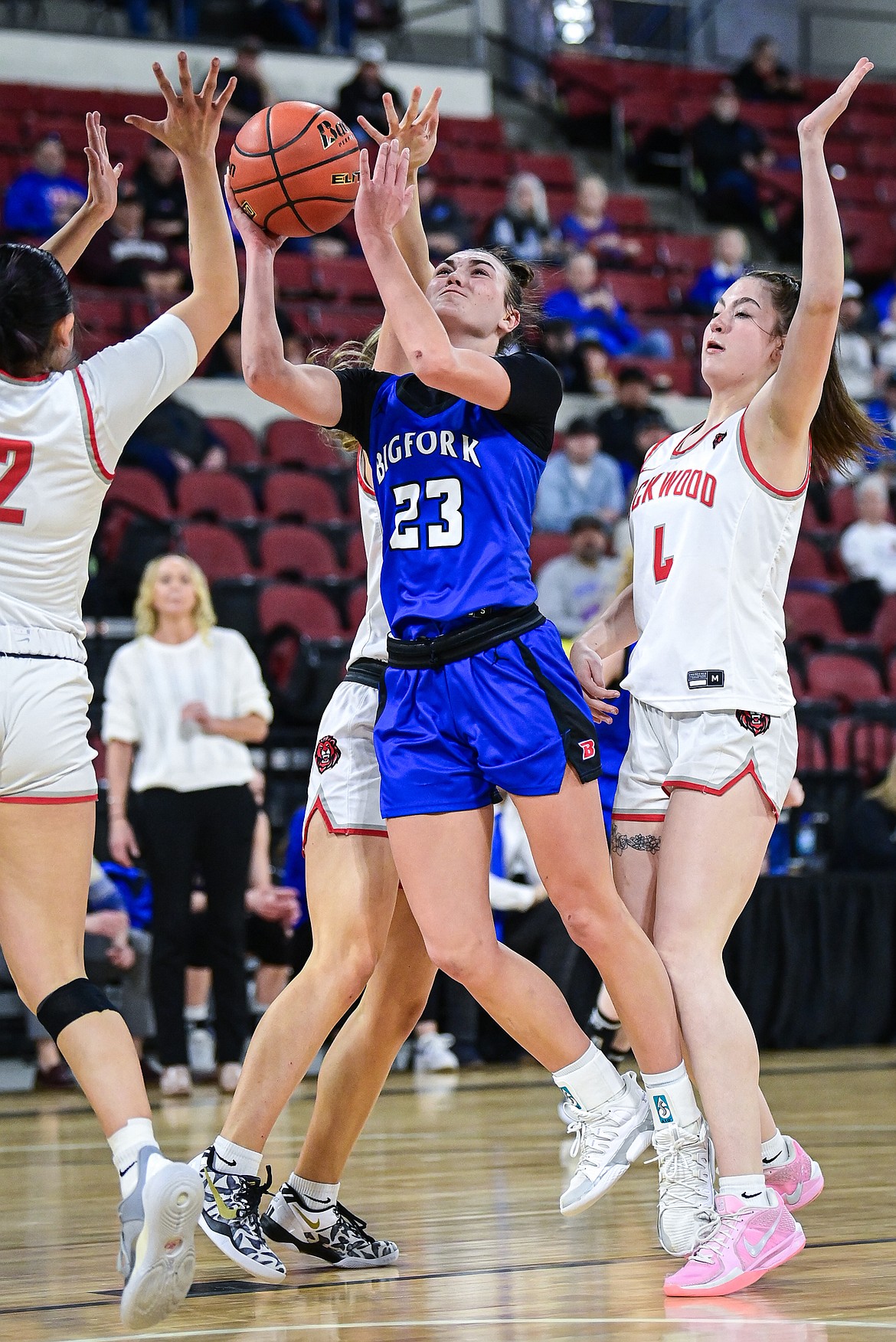 Bigfork's Paeten Gunlock (23) shoots in the second half against Lockwood at the Class A State Basketball Tournament at the MetraPark First Interstate Arena in Billings on Saturday, March 15. (Casey Kreider/Daily Inter Lake)
