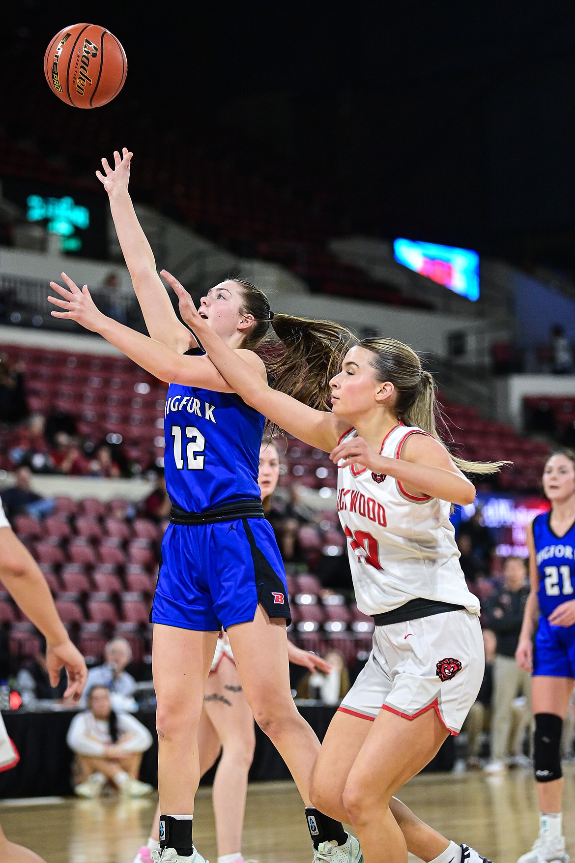 Bigfork's Keni Wade (12) shoots in the second half against Lockwood at the Class A State Basketball Tournament at the MetraPark First Interstate Arena in Billings on Saturday, March 15. (Casey Kreider/Daily Inter Lake)