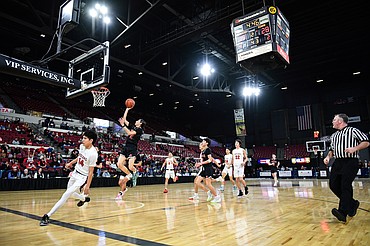 Ronan's Tayen Edmo (2) drives to the basket in the second quarter against Browning at the Class A State Basketball Tournament at the MetraPark First Interstate Arena in Billings on Saturday, March 15. (Casey Kreider/Daily Inter Lake)