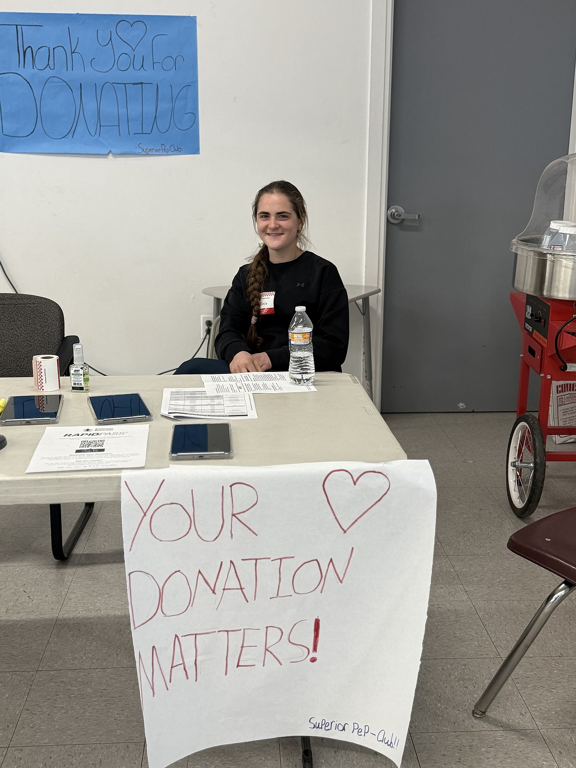 Josie Crabb worked the registration table of the Superior School Pep Club’s first American Red Cross Blood Drive (Photo provided)