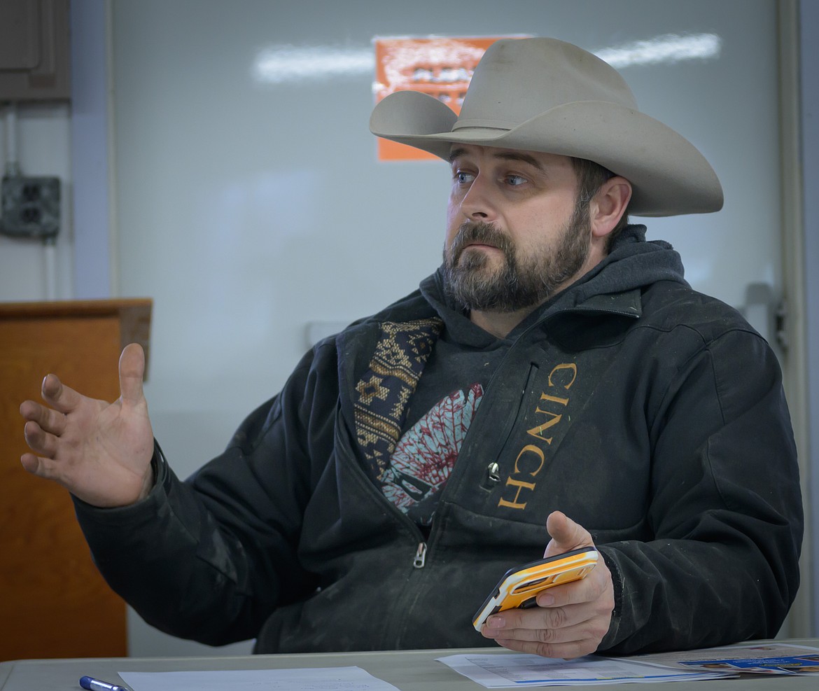 Sanders County Fair Commision member Brian Crain discusses the three security bids for the upcoming county fair. (Tracy Scott/Valley Press)