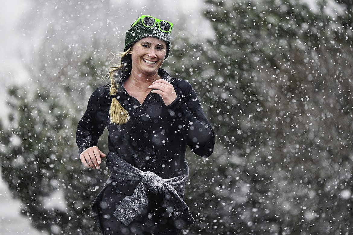 April Barth runs during the Cloverfest 5K Fun Run. Seth Anderson Photo.