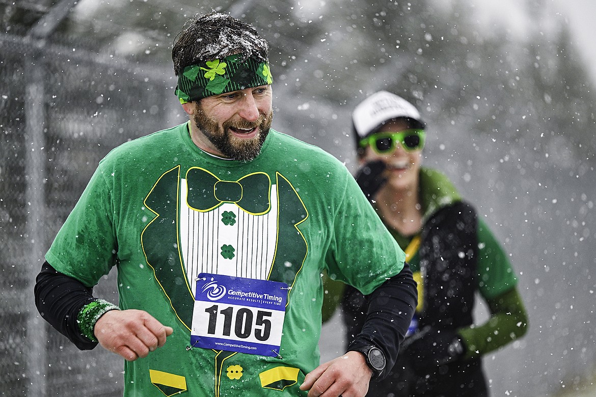 Runners are all smiles during the Cloverfest 5K Fun Run. Seth Anderson Photo.