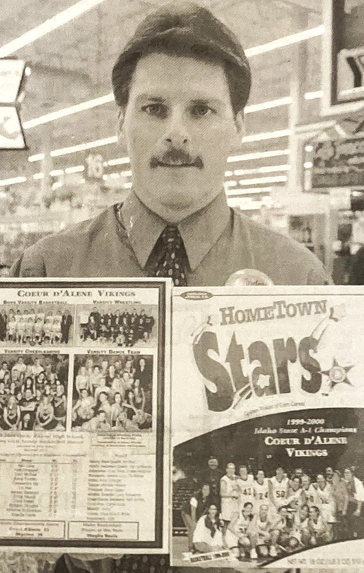 Tidyman’s director Pat Dahmen displays Hometown Stars cereal in 2000.
