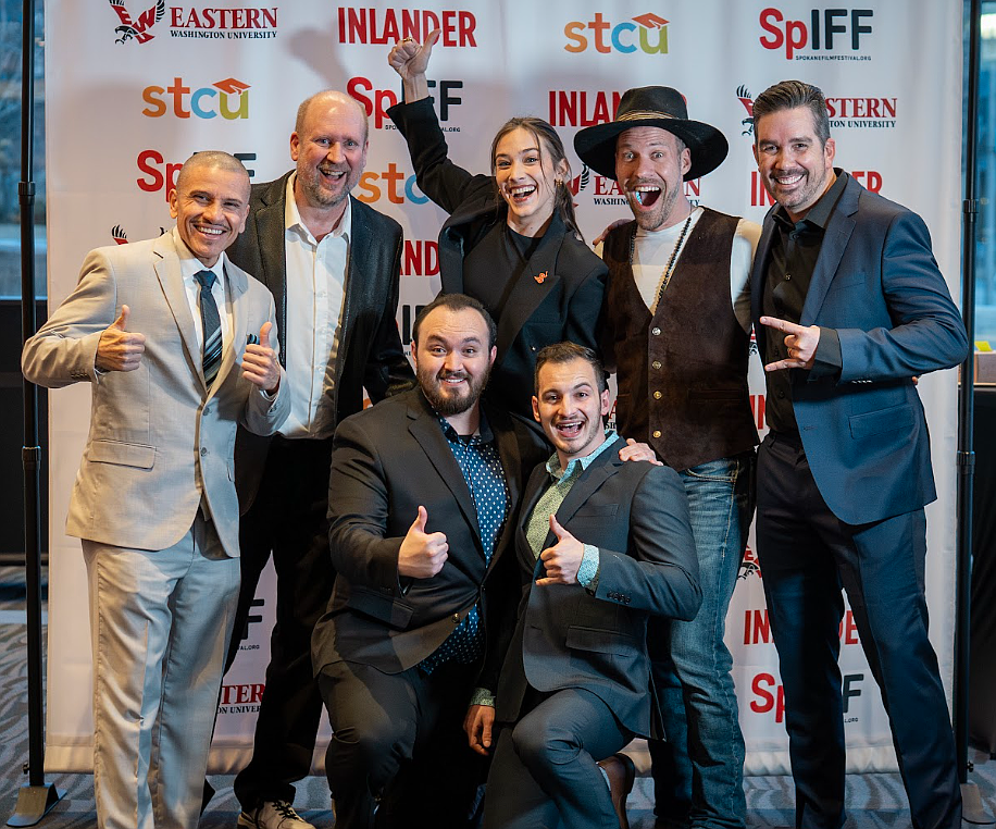 Director Caden Butera, front left, and music composer/brother Rylan Butera, front right, enjoy a photo opportunity with the lead cast of the award-winning "Recollection" during the film's premiere March 7 at the Spokane International Film Festival. Back row, from left: Cesar Garcia, Charles Fletcher, Rosslyn Luke, Falk Hentschel and Stephen Morton.