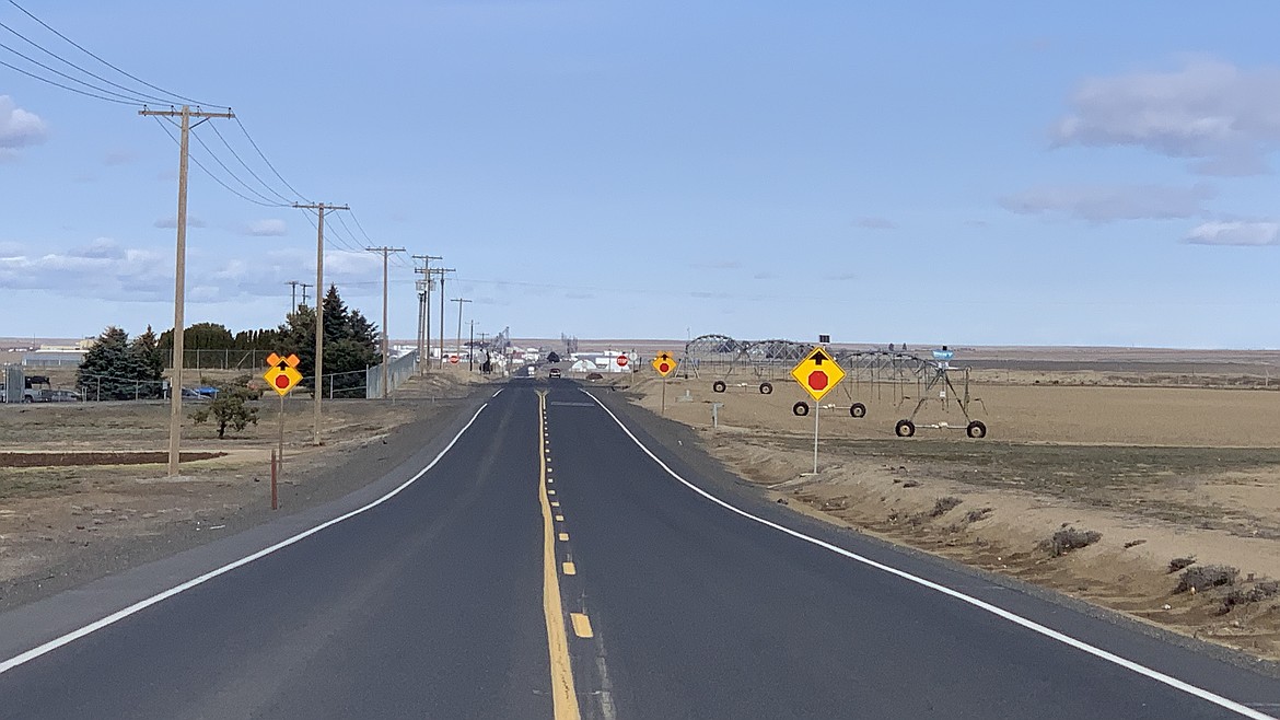 Fourteen intersections along Adams County roads near Othello will get additional traffic signs as part of a project to enhance traffic safety.