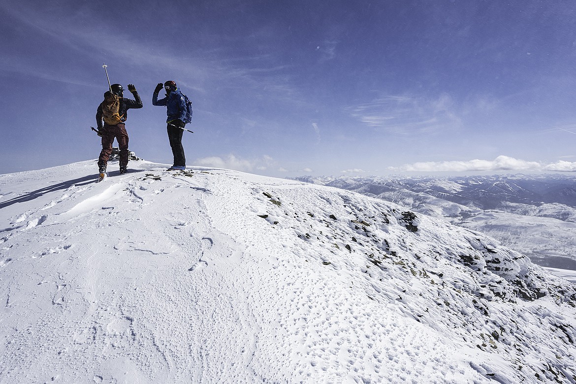 Adam Cazell and Adam Clark atop Summit Mountain in Glacier National Park. Seth Anderson Photo.