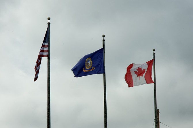 Bonners Ferry city officials reraised the Canada flag on government property May 6 after establishing a 365-day special occasion recognizing its Canadian neighbors.