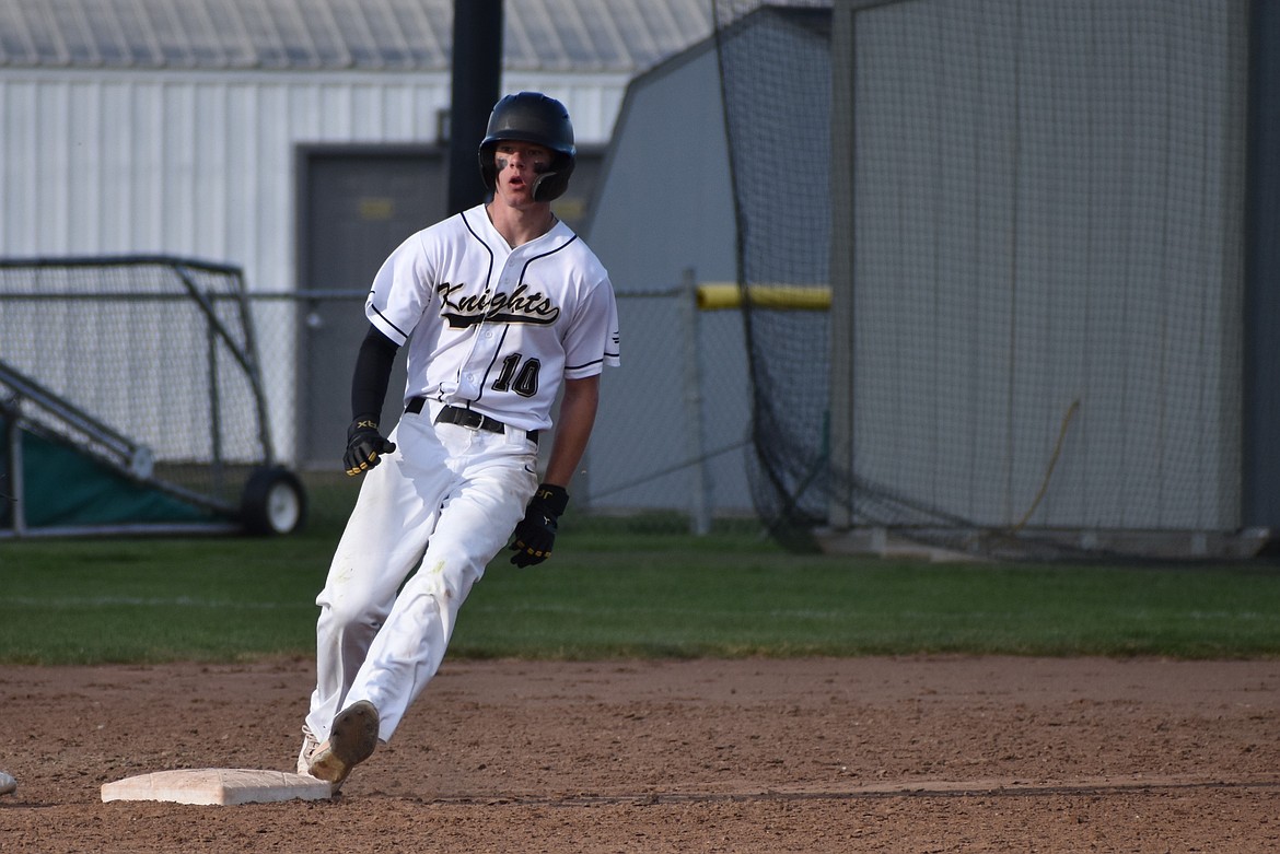 Bryan Larsen helped keep the Knights in the first game by drawing a walk and scoring one run.