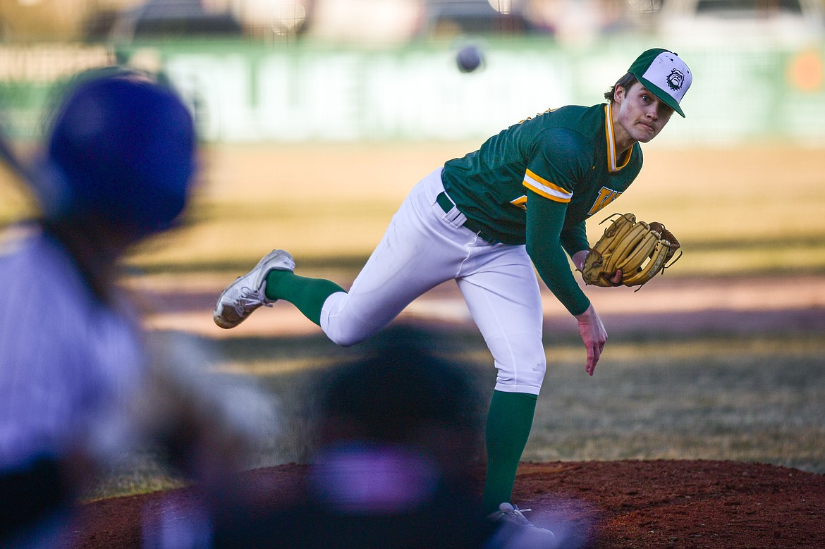 Whitefish pitcher Reed Boyer (22) delivers against Columbia Falls at Sapa-Johnsrud Memorial Field on Friday, April 4. (Casey Kreider/Daily Inter Lake)