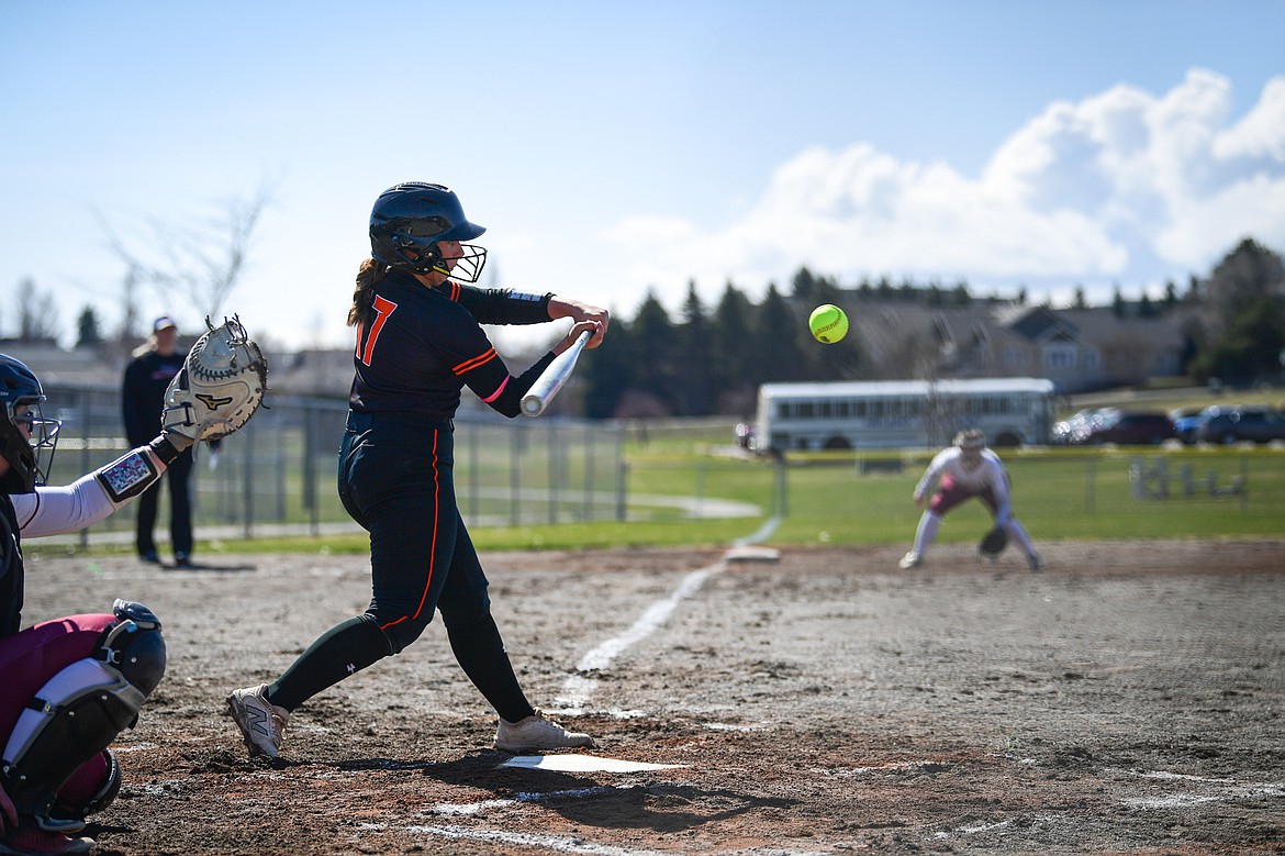 Flathead's Reese Conley (17) connects on a single against Helena at Kidsports Complex on Friday, April 4. (Casey Kreider/Daily Inter Lake)