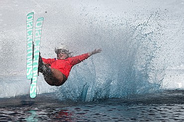 A skier splashes into the pool at Whitefish Mountain Resort's pond skim on Saturday, April 5. (Casey Kreider/Daily Inter Lake)