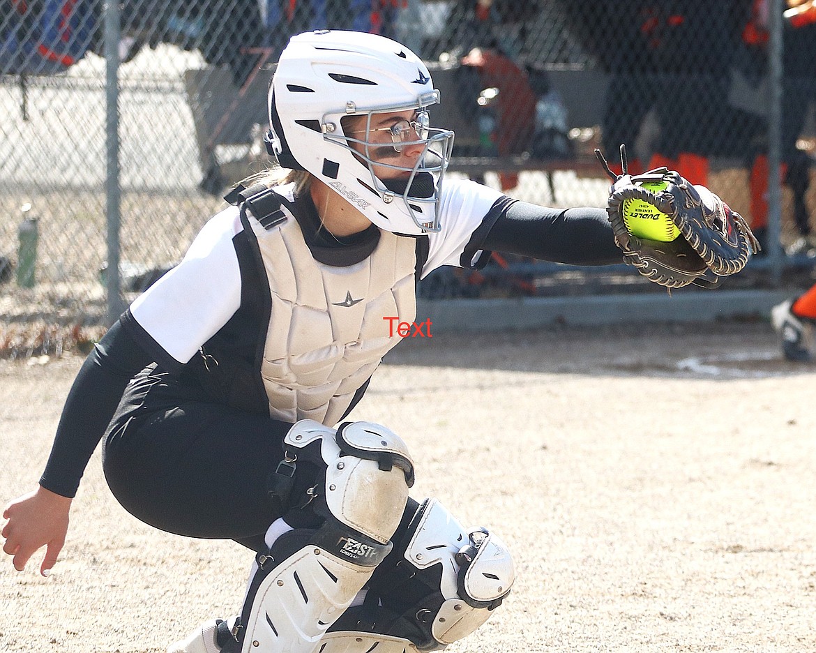 MAC's senior catcher Maddy Hanken nabs the ball during the team's 15-4 triumph against Plains last Friday. (Caroline Roesch photo)