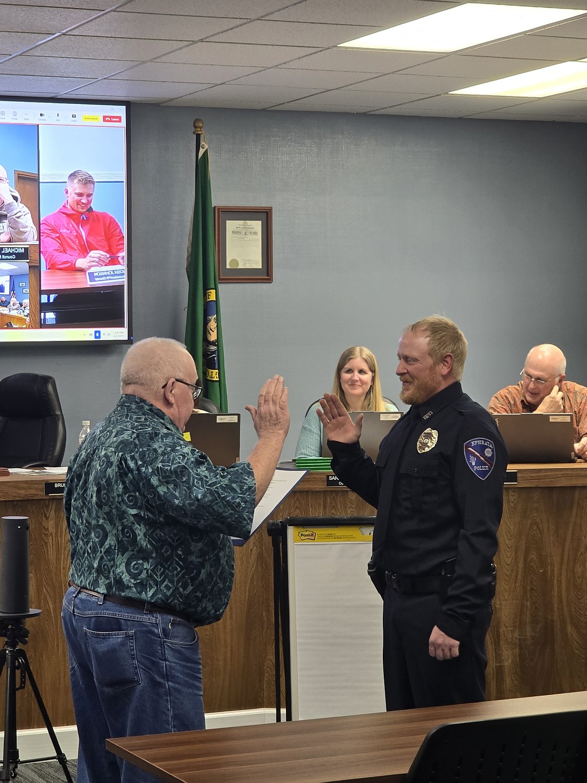 Mayor Bruce Reim swore in Ephrata Police Department Officer Jake Leenhouts during Thursday's city council meeting in Eprhata.