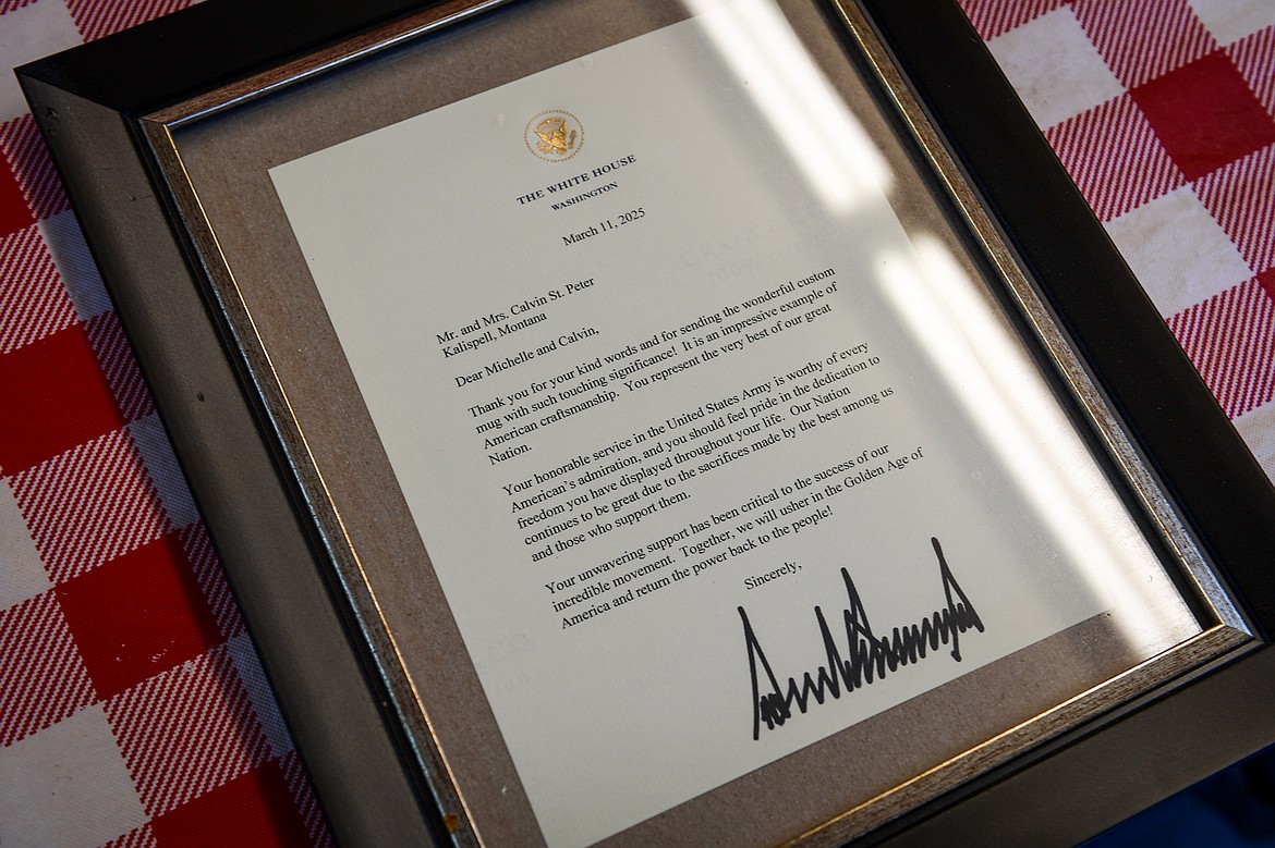 A letter from President Donald Trump to Calvin and Michelle St. Peter thanking them for their support and a custom mug. (Casey Kreider/Daily Inter Lake)