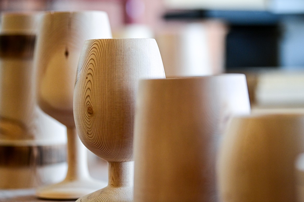 Custom wood-worked pieces await a coat of epoxy at Mug Man Woodworking on Tuesday, April 8. (Casey Kreider/Daily Inter Lake)