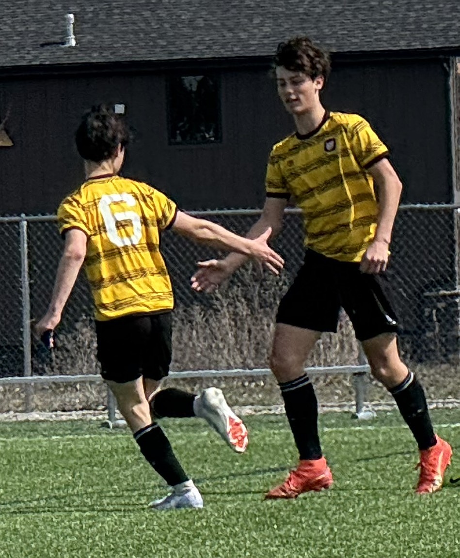 Photo by KRISTEN DVORACEK
The Sting 2011 Boys Academy soccer team won three of four games games over the past two weekends to close out the EA League season. Pictured is Eli Lorhan-Lewis (6) giving a high-five to Jay Blue, who scored a goal.