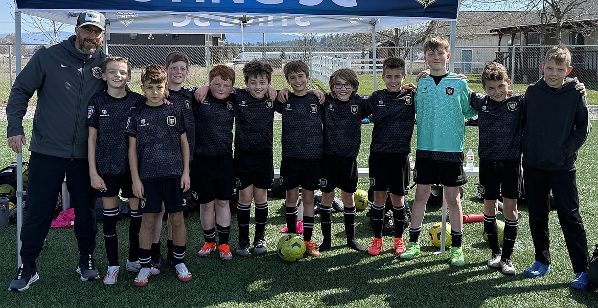 Courtesy photo
The Sting 2014 boys EA Academy team hosted its final EA League games last weekend against Western Washington Surf and Atletico (Bellevue, Wash.). From left are coach Nick Funkhouser, Kellen Gillespie, Levi Russu, Carter Woodcock, Calvin Conley, Braedy Newman, Grant Quinn, Emmett Shirts, Benaiah Lorona, Torin Chestnut, Caeden Butler and Kade Alvarado.