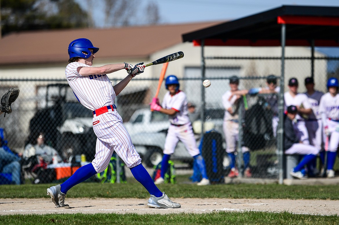 Bigfork's Cavin Wiest (16) connects on a single against Eureka at ABS Park on Thursday, April 10. (Casey Kreider/Daily Inter Lake)