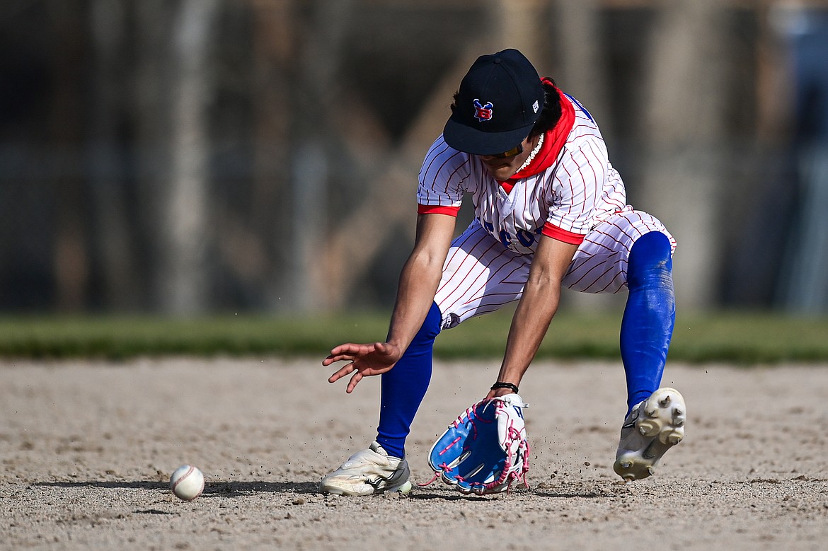 Bigfork second baseman Rye Rodriguez (23) fields a grounder for an out against Eureka at ABS Park on Thursday, April 10. (Casey Kreider/Daily Inter Lake)