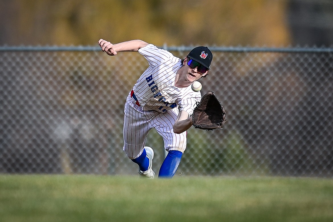 Bigfork centerfielder Cavin Wiest (16) tracks down a line drive against Eureka at ABS Park on Thursday, April 10. (Casey Kreider/Daily Inter Lake)