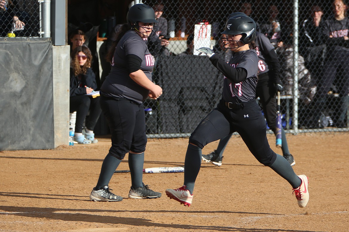 ACH’s Madison Brink scores a run against Wellpinit last year.The Warriors racked up two wins in their doubleheader against Omak.