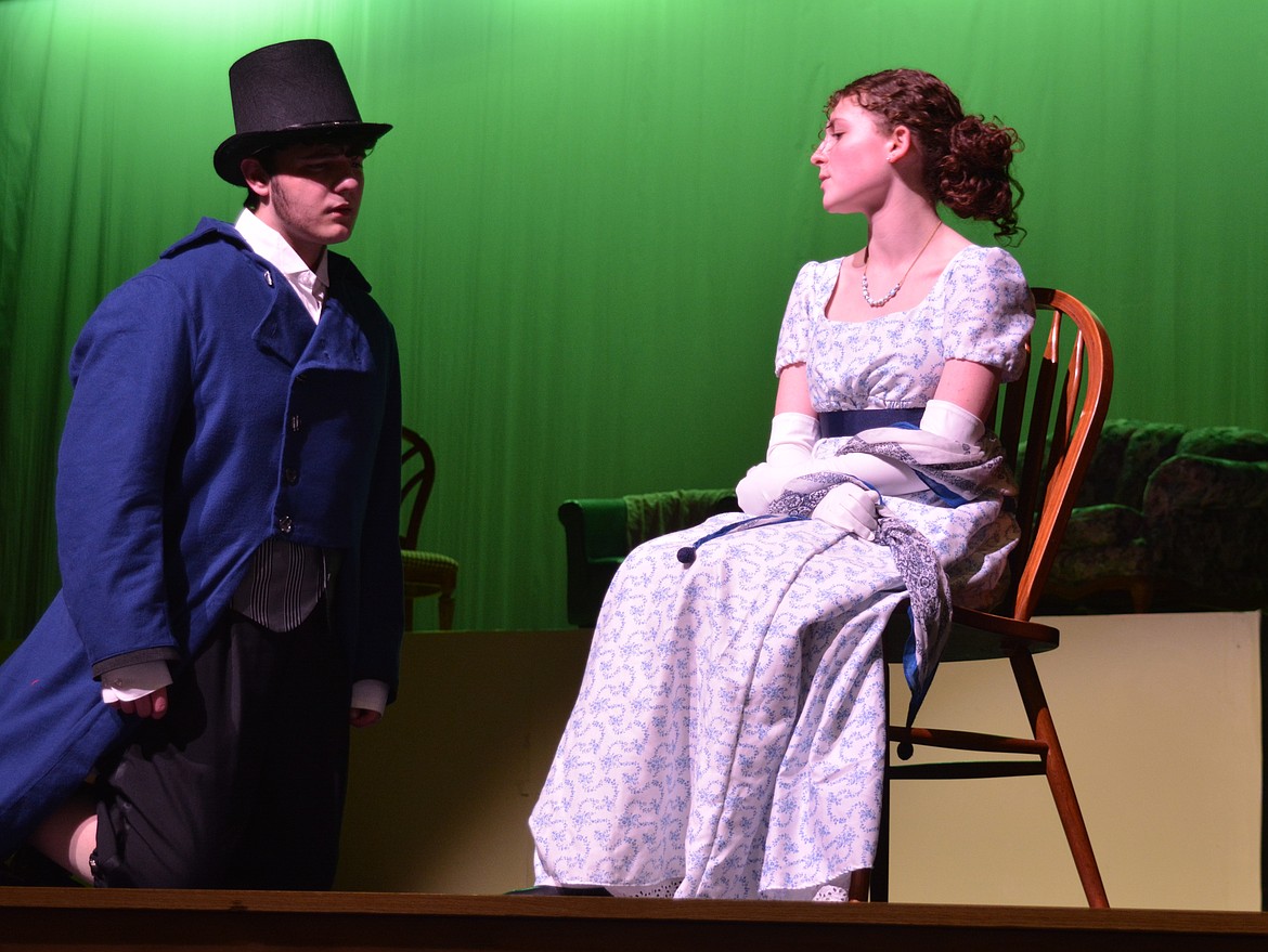 Gavin Tibulski as Mr. Darcy proposes to Elizabeth Bennet played by Emery Mannel in the Trojan Theatre Department production of "Pride and Prejudice."