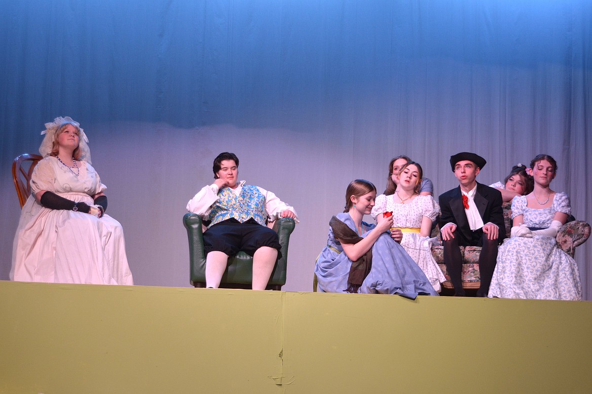Students portraying the Bennet family and Mr. Collins move through a scene in the Post Falls High School production of "Pride and Prejudice."
Pictured: Eden Manning, S. McGruder-Naron, Emma Ennis, Kamryn Barraza, Jaedyn Sandford, Michael Waite, Madilyn Mushaney, Emery Mannel.