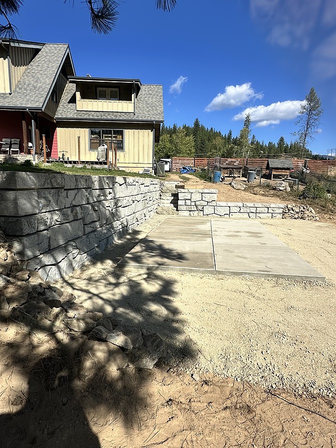 This retaining wall and pad are just some of the services that Silver Valley construction company, Delvepro, can provide.
