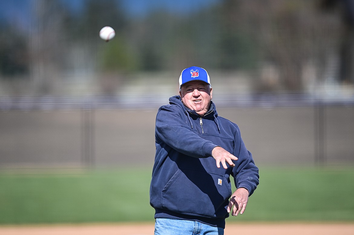 Dan Purcell throws out the first pitch before the first game at Flathead Beacon Field between Bigfork and Troy on Thursday, April 17. (Casey Kreider/Daily Inter Lake)