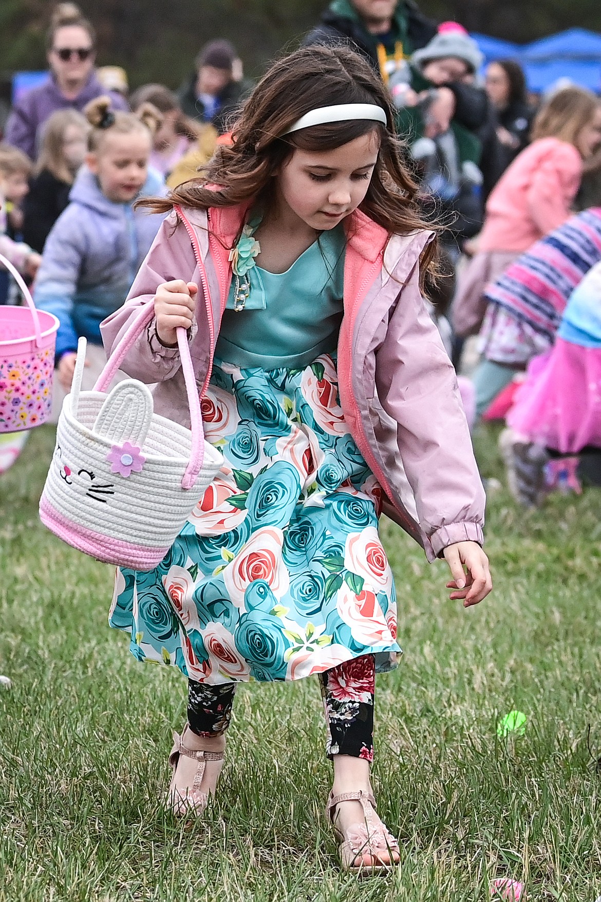 Kids race to scoop up eggs at the Hope Church Helicopter Egg Drop Eggstravaganza on Saturday, April 19. (Casey Kreider/Daily Inter Lake)
