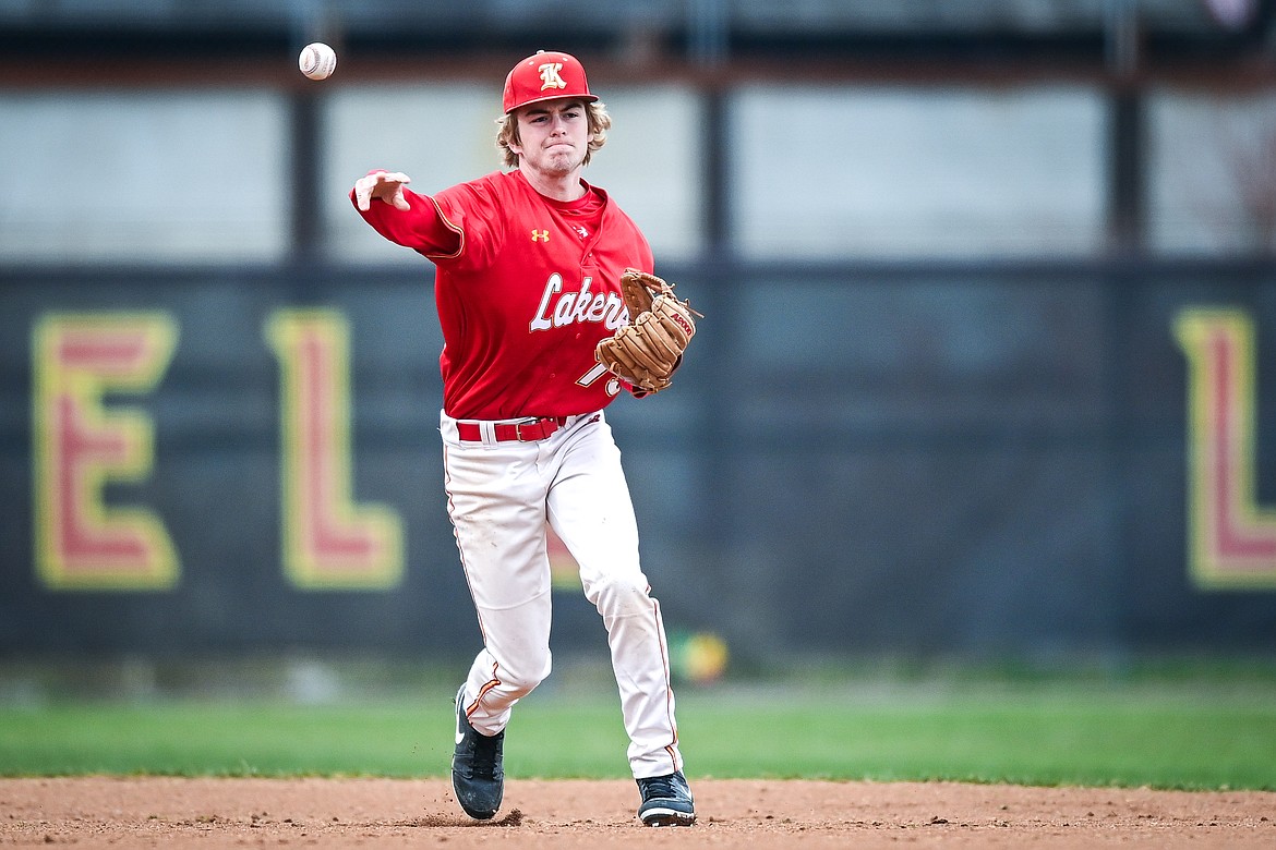 Lakers AA second baseman Hunter Fann (15) throws to first for an out in the first inning against the Calgary Cardinals at Griffin Field on Saturday, April 19. (Casey Kreider/Daily Inter Lake)