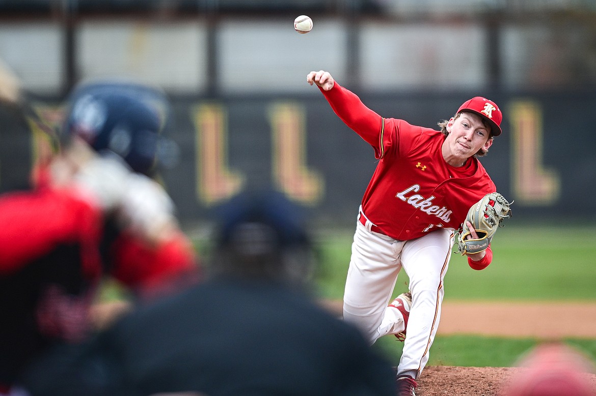 Lakers AA starting pitcher Kyler Croft (11) delivers in the first inning against the Calgary Cardinals at Griffin Field on Saturday, April 19. (Casey Kreider/Daily Inter Lake)