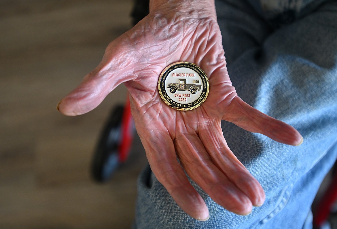 Robinson is the first person to receive a centurion challenge coin from the Glacier Park Post of the Veterans of Foreign Wars of the United States. (Hailey Smalley/Daily Inter Lake)