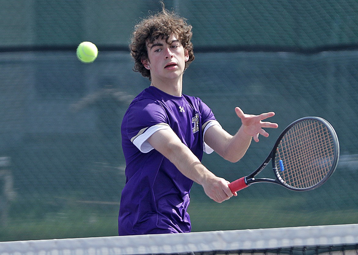 Polson's Brody Kline returns the ball during a doubles match against Stevensville. (Bob Gunderson photo)