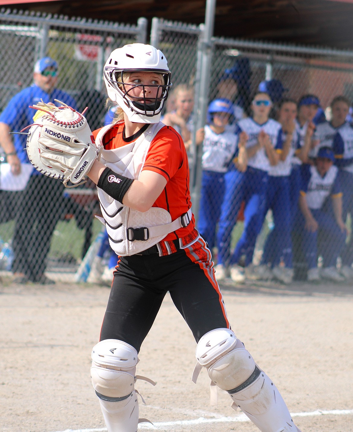 Ronan Catcher Shelby Taylor looks to throw to first to get the out in a battle against Libby. (Kaleb Unger/Leader)