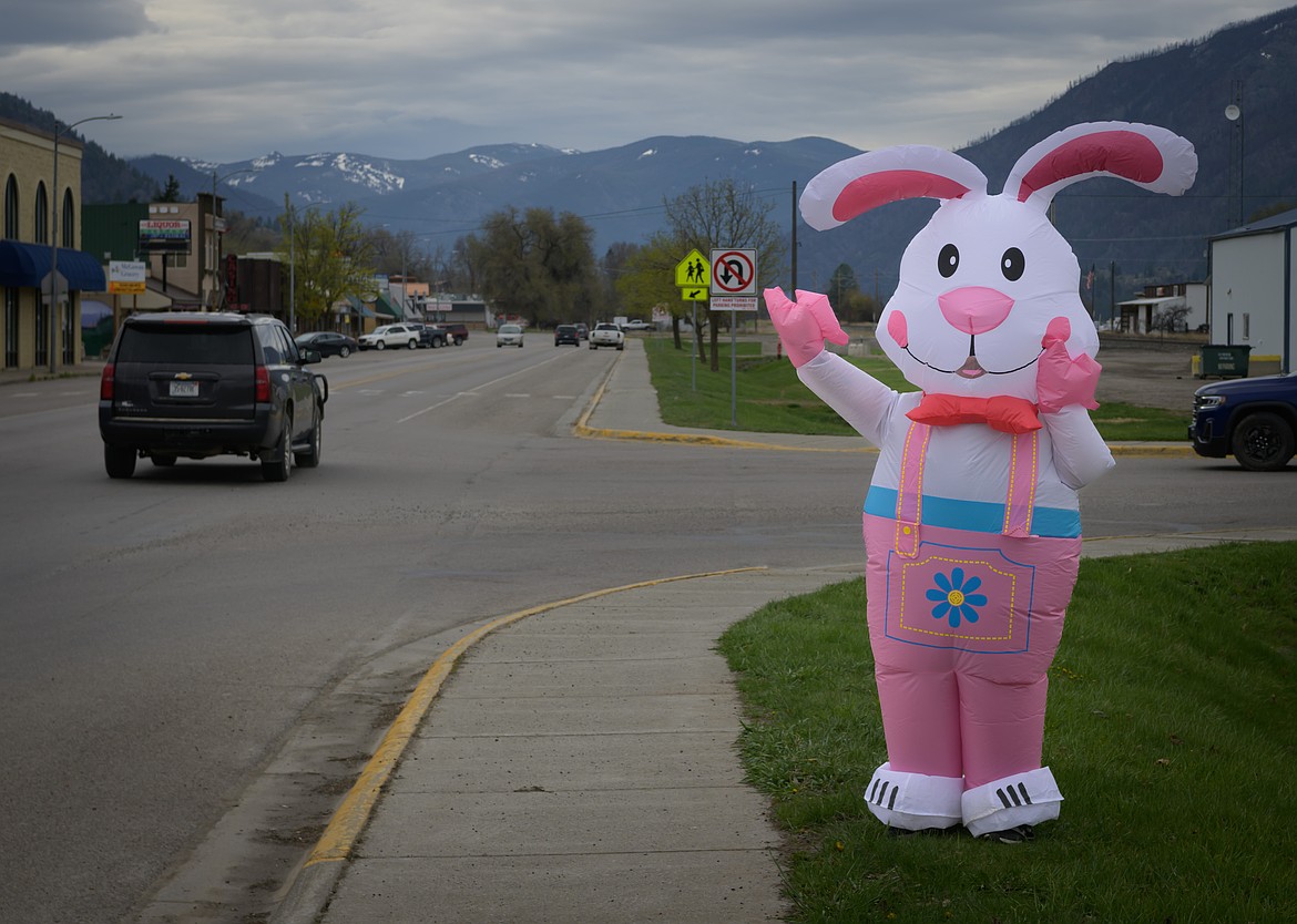 Becky Fields, owner of Warrior Fitness, does her part to attract business for this year's Lion Club breakfast and Easter egg hunt along Railroad Avenue. (Tracy Scott/Valley Press)