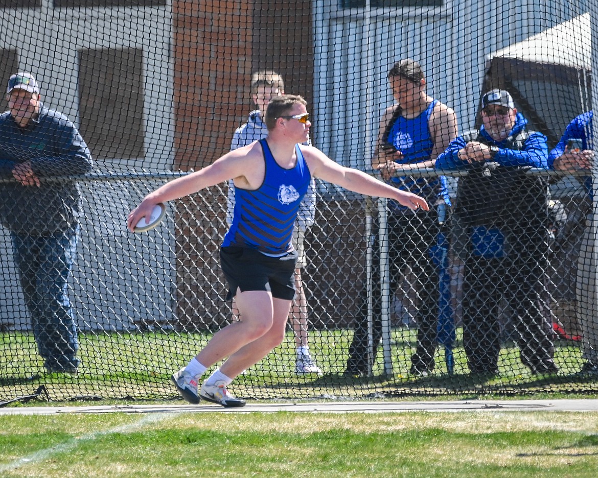 Mission’s Ryan Sharbono tossed the discus 134 feet, 8 inches for sixth place in the SSHS Track Meet in Missoula. (Christa Umphrey photo)