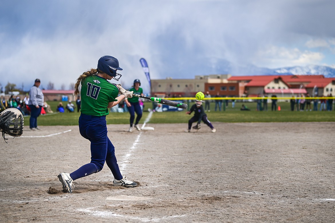 Glacier's Olivia Warriner (10) drives in the go-ahead run with a two-run single in the sixth inning against Butte at Glacier High School on Tuesday, April 22. (Casey Kreider/Daily Inter Lake)