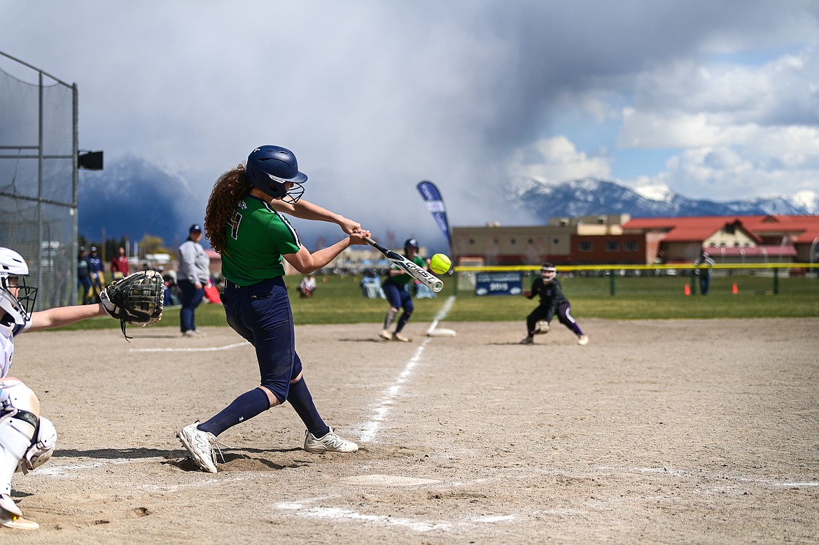 Glacier's Olivia Gibbons (4) drives in two runs with a double in the fifth inning against Butte at Glacier High School on Tuesday, April 22. (Casey Kreider/Daily Inter Lake)