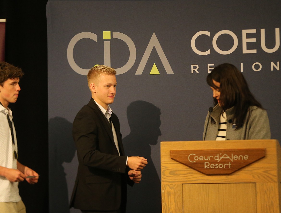 Coeur d'Alene High School senior and ASB President Payton Conn receives a $500 Strength of Character scholarship Tuesday morning at The Coeur d'Alene Resort during a historic Coeur d'Alene Regional Chamber scholarship breakfast.
