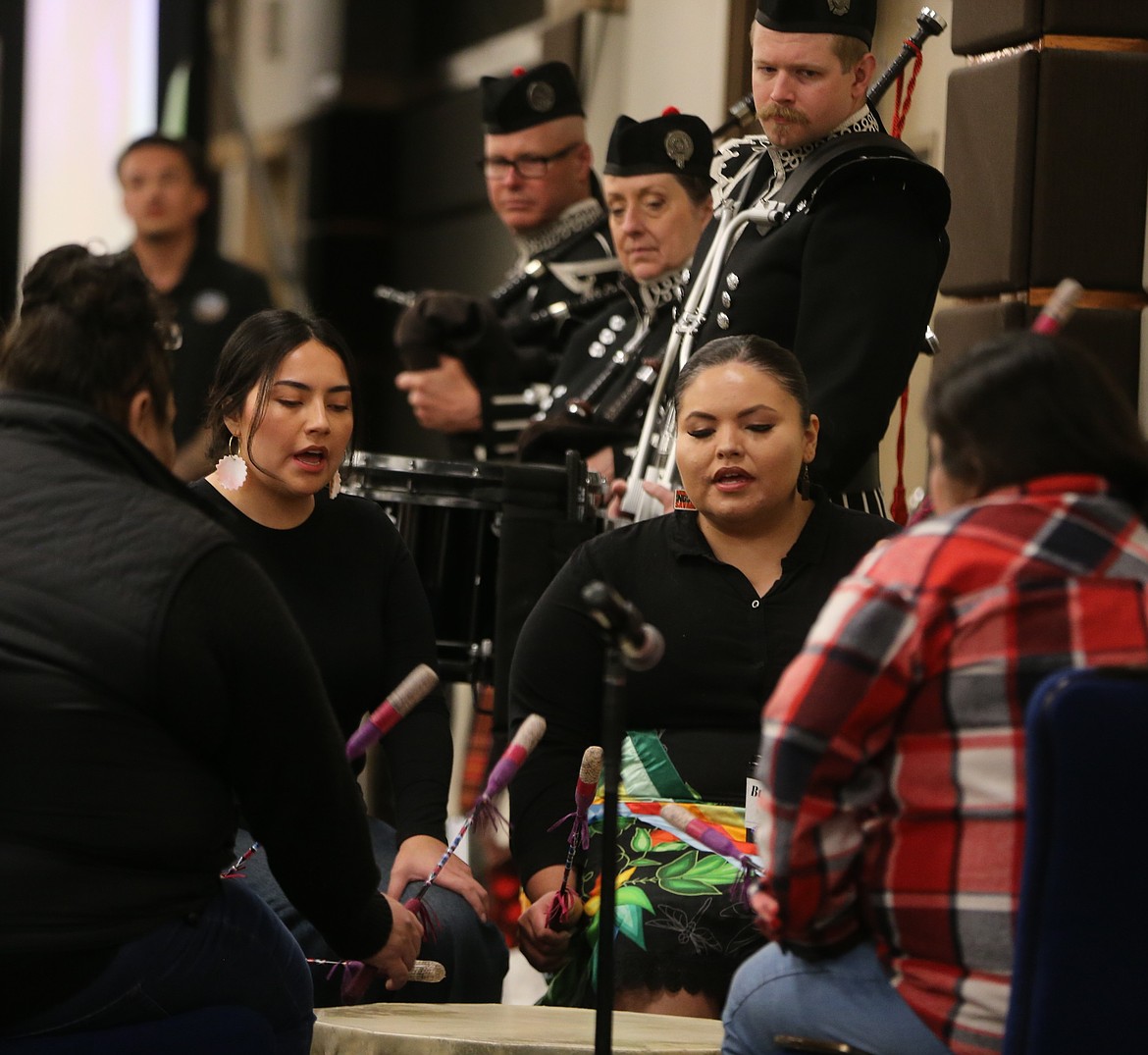 Rose Creek Singers Jade Mokry, left, and Kamille Sims perform at the Coeur d'Alene Regional Chamber Scholarship Breakfast Connect on Tuesday morning.